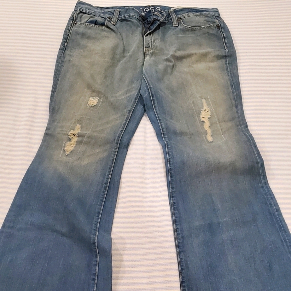 Denim boot cut jeans with rips